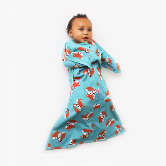 Baby sleeping in Friendly Fox animal print Zipadee-Zip