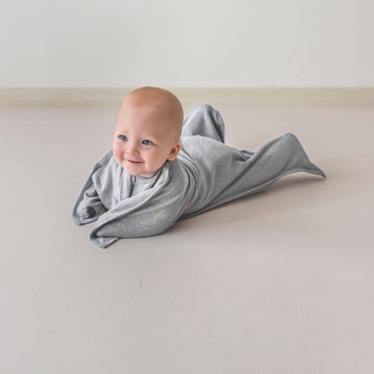 #Baby wearing Heather Grey Zipadee-Zip swaddle transition2