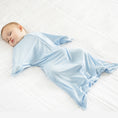 Load image into Gallery viewer, Baby wearing Sky Blue bamboo Zipadee-Zip swaddle